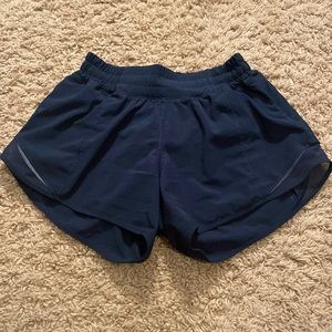 Lululemon hotty hot shorts 4” size 4 in navy blue color.
